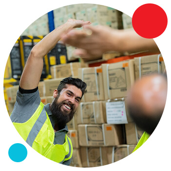 HP circle - preventative intervention Photo of a man in a warehouse setting doing stretching exercises
